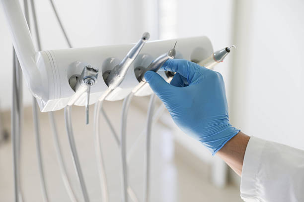Professional Teeth Cleaning And Checkup technician working in Carle Place, NY